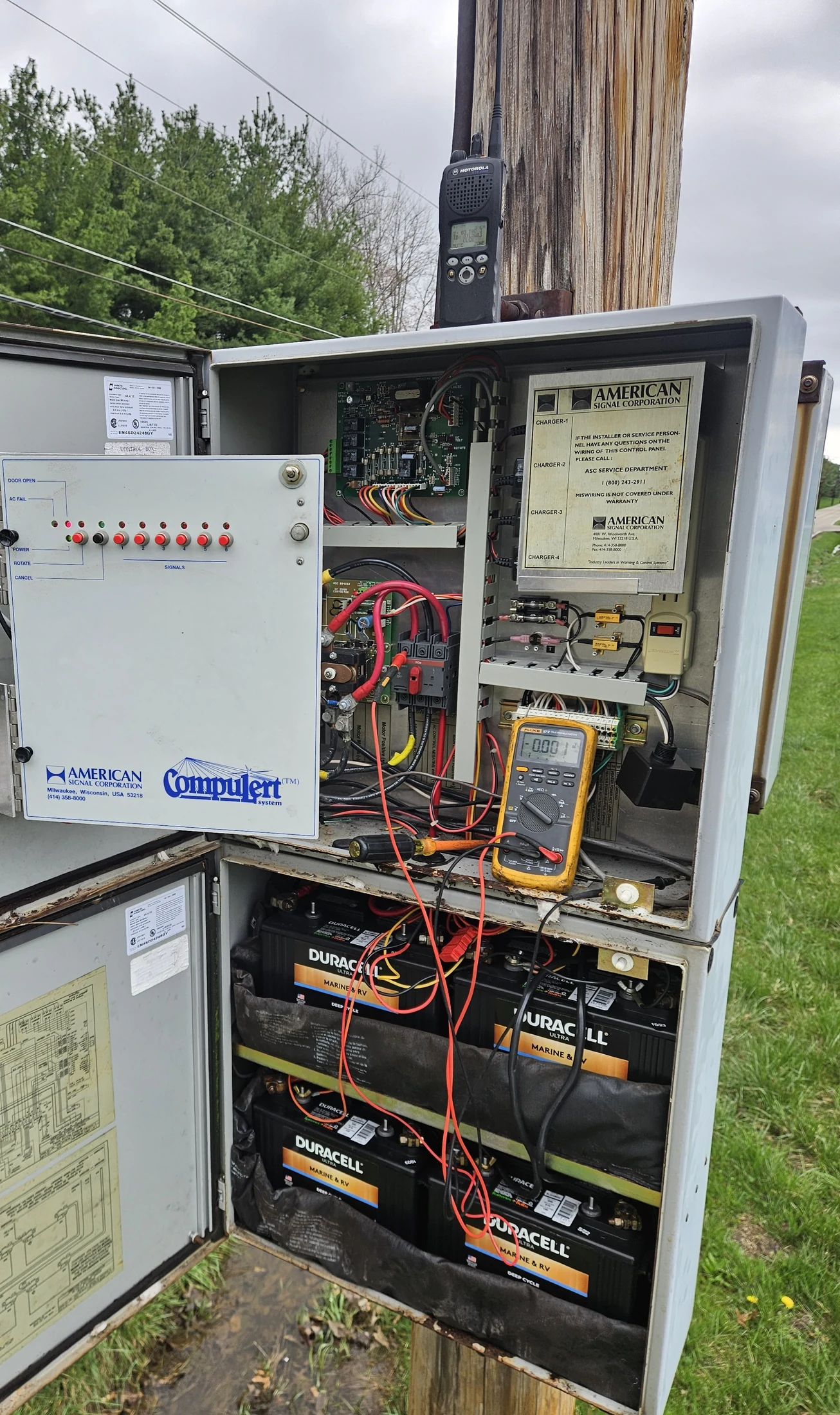 Outdoor warning siren control cabinet being tested